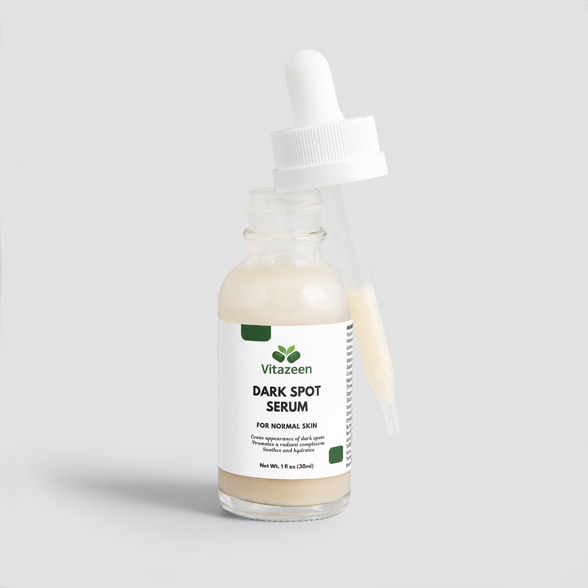 Vitazeen dark spot serum bottle on a light gray background